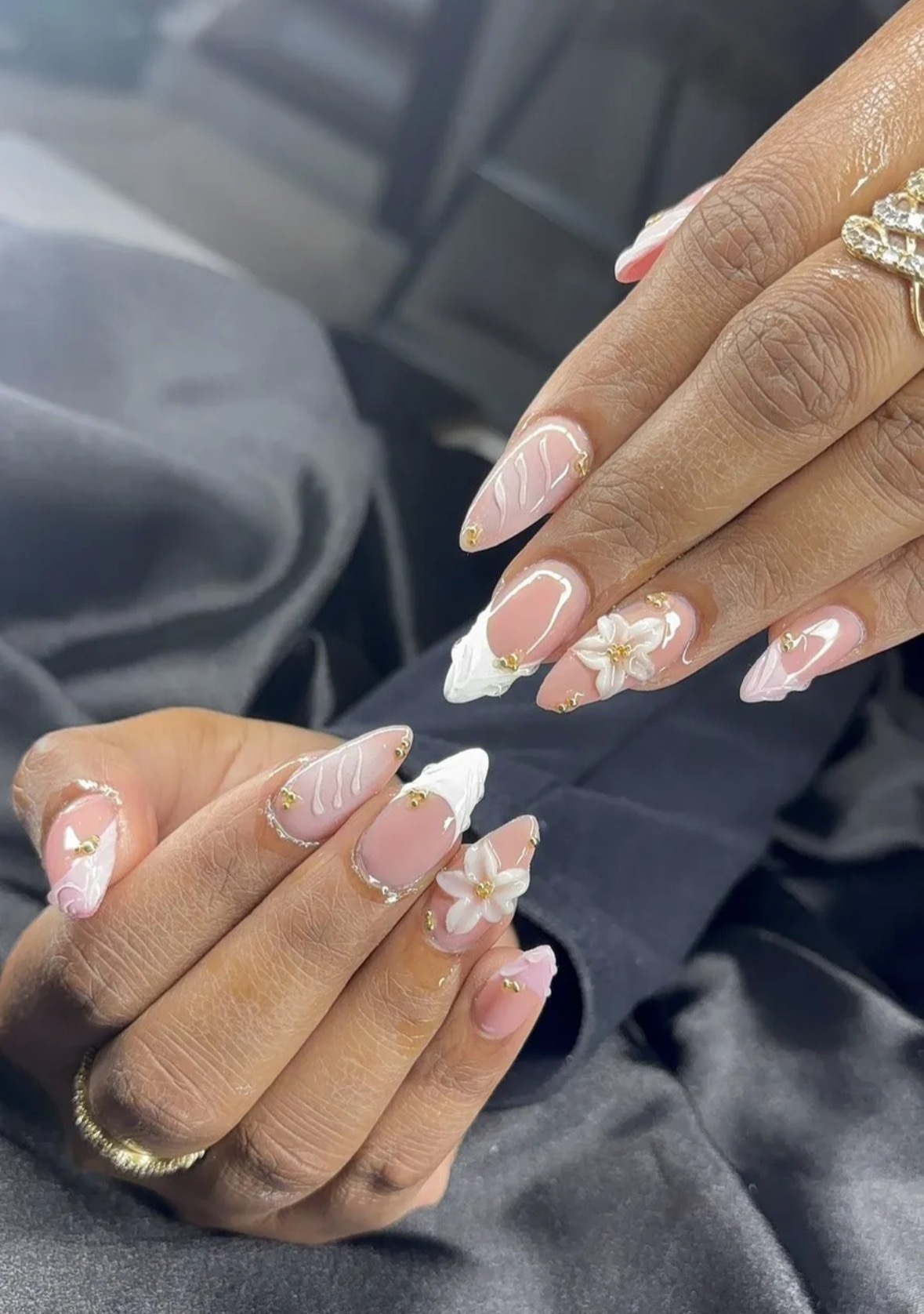 Leopard print and burgundy stiletto nails with gold charms