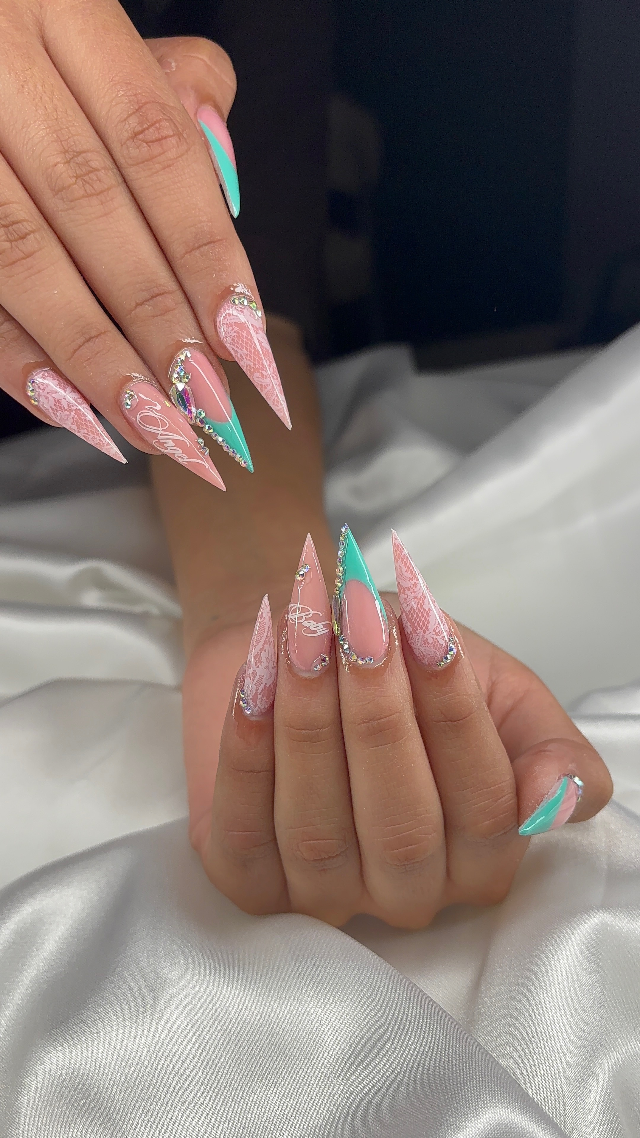 Pastel green and lilac chrome almond nails