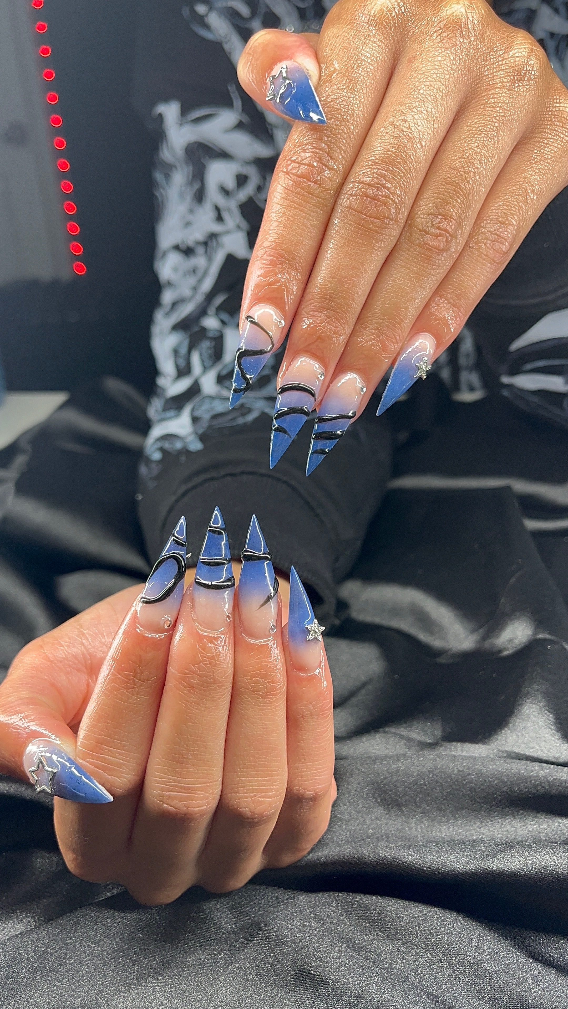 White French tip nails with pink 3D flowers