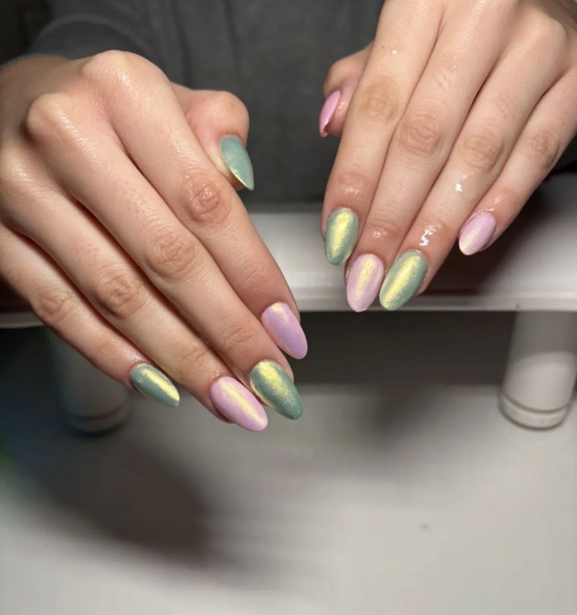 White French tip nails with pink 3D flowers